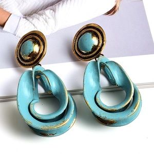 Blue and gold design earrings